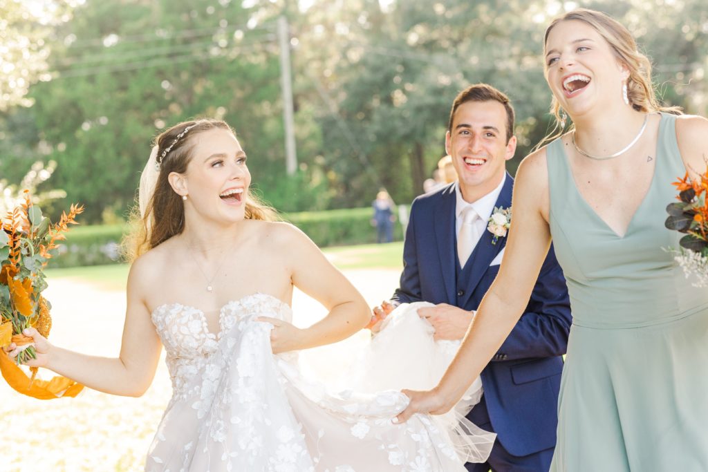 Bride laughing with bridesmaid