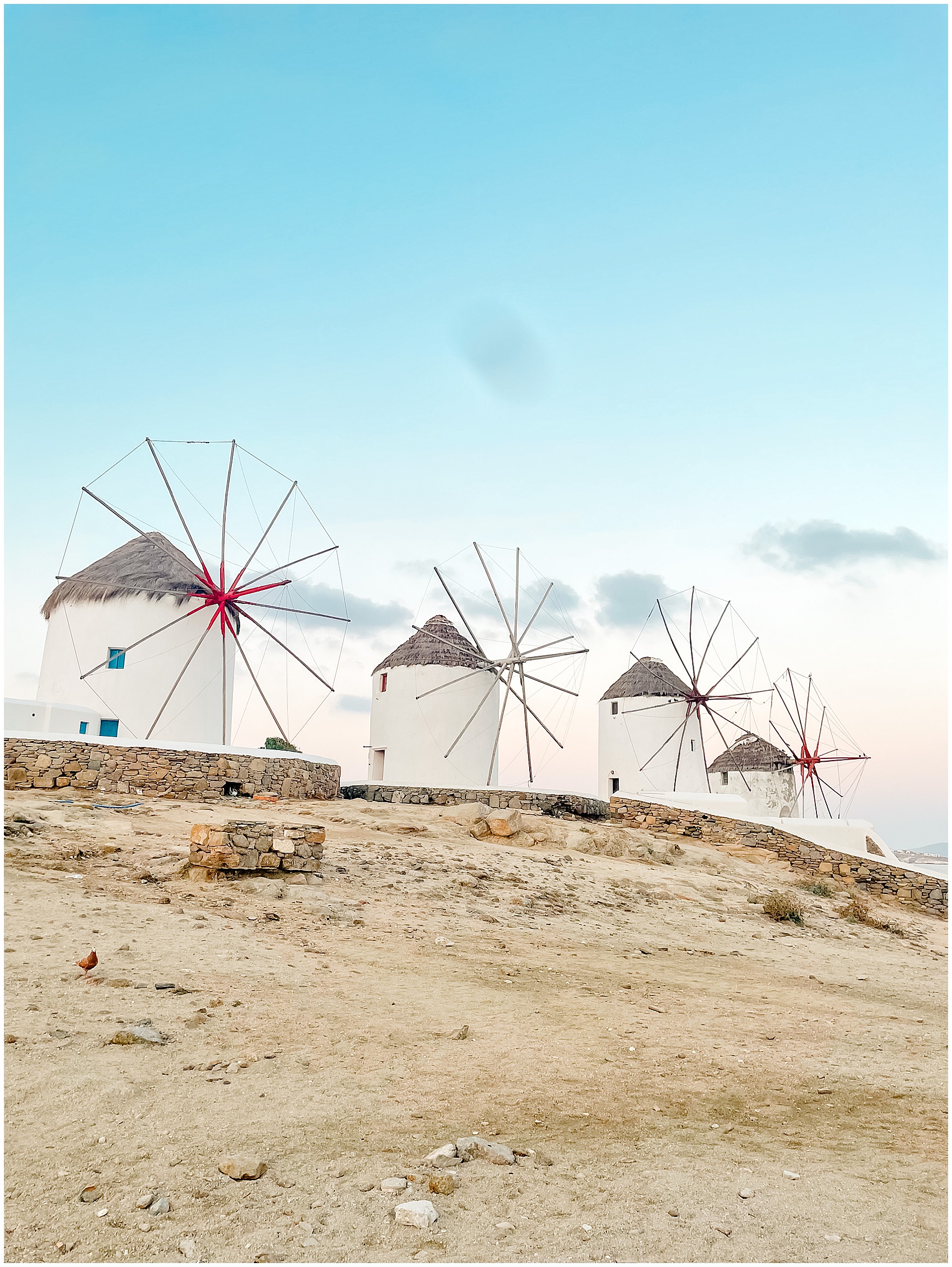 windmills on a hillside greece photoshoot
