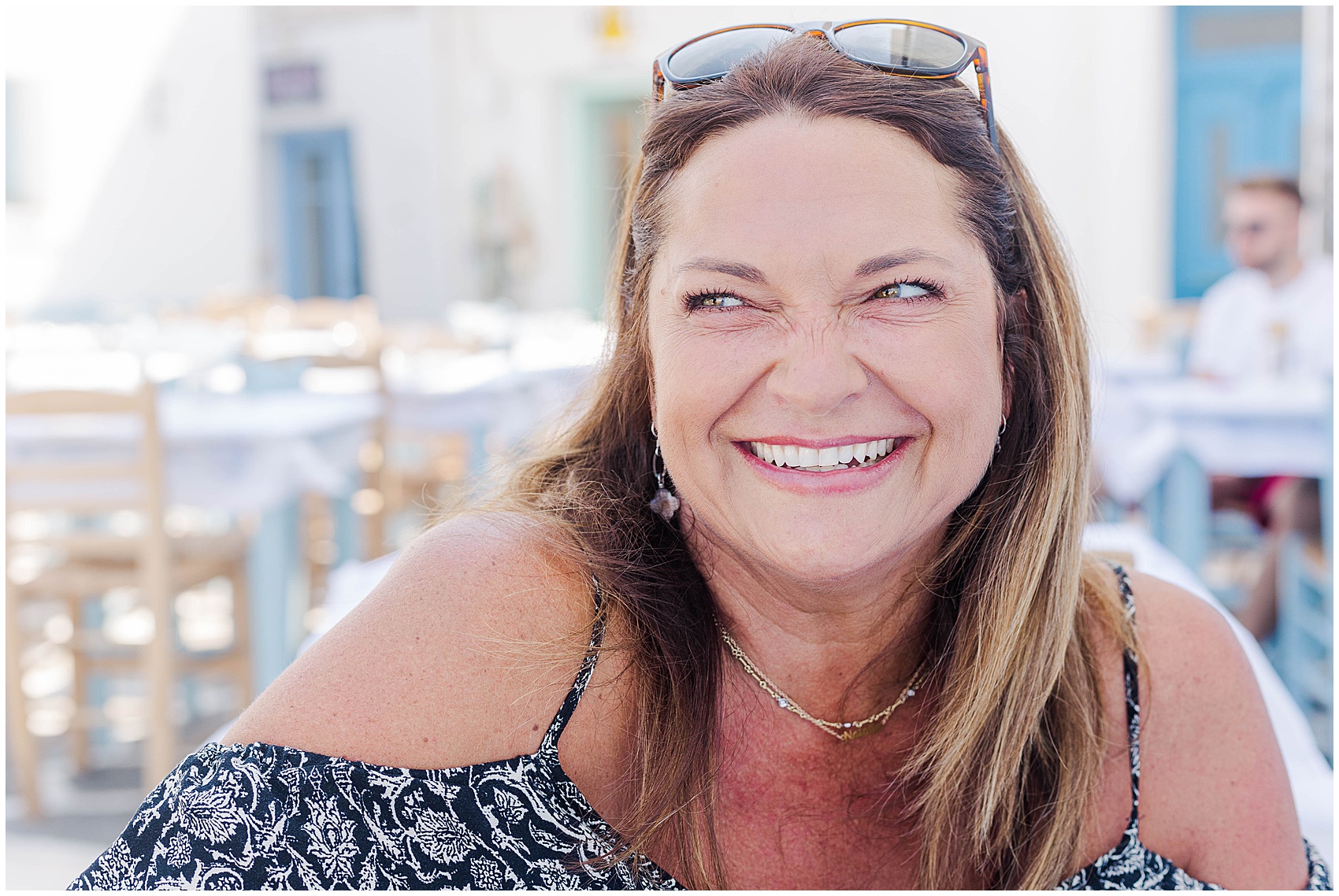 woman laughing greece photoshoot
